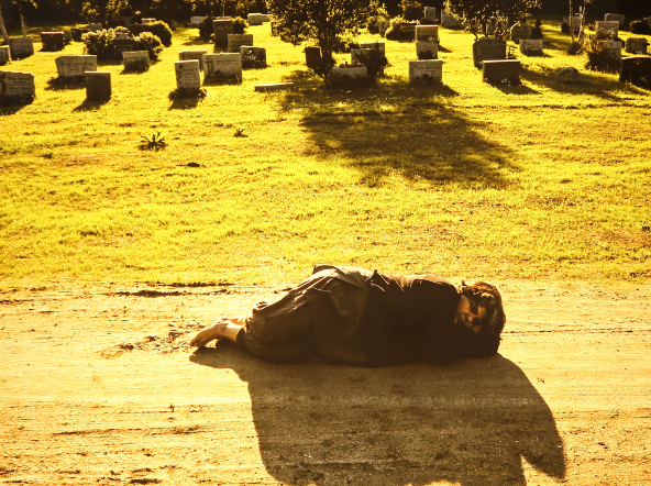 Somnambulists VI (from the staged photo series, lying down on the ground)